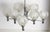 Vintage sputnik chandelier with eight radial chrome-plated steel arms and hand-blown faceted glass globes, with mid-...