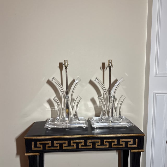 This is a stunning matching pair of vintage Mid-Century Modern table lamps, very similar in style to iconic designs by the...
