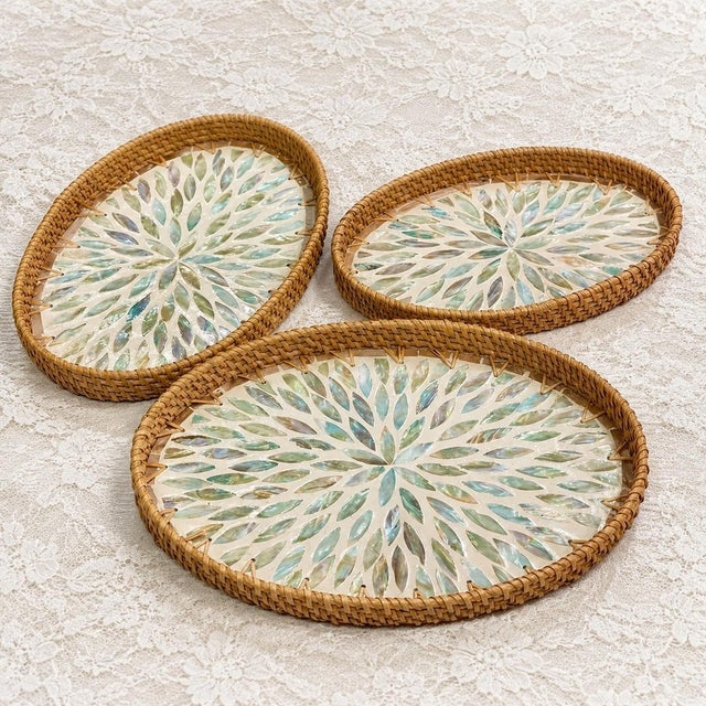 This set of three oval trays is hand-woven and inlaid by craftsmen. The rattan edges are flexible and firm, and the...