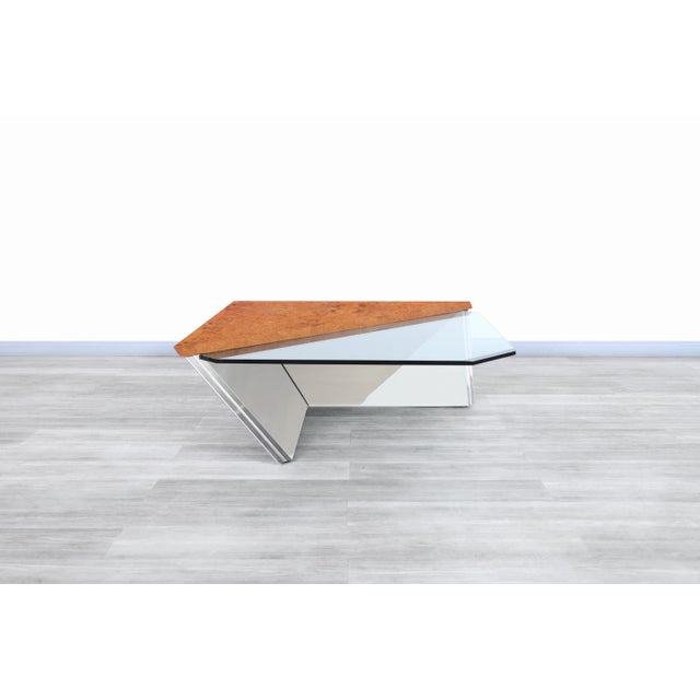Mid-century modern cantilever coffee table attributed to J. Wade Beam for Brueton, featuring a dramatic combination of...