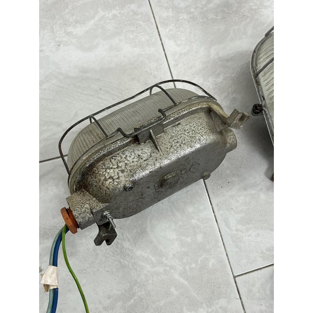 Set of 3 Mid-Century Industrial Cast Iron and Glass Wall Lamps, 1950s Found in an abandoned industrial warehouse. Good...