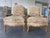 Pair of French-style bergère armchairs by Century Furniture with nicely carved wood frames and a warm, even finish....