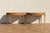 Beautiful antique pair of demi-lune console tables from the 1920s, crafted from solid fruitwood and featuring elegant...