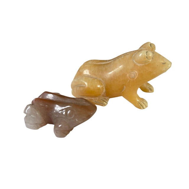 Vintage set of two hand-carved frog sculptures crafted from soapstone and agate. The smaller piece measures 2.25"D × 1.5"W...