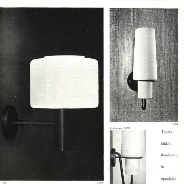 Beautiful dutch modernist wall lamps by the raak design team from the 1960s. These so-called torch lamps, with model name...