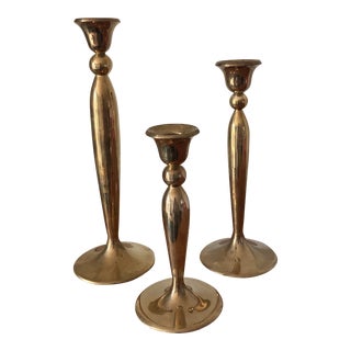 Set of Three Vintage Mid 20th Century Solid Brass Candle Holders Candlesticks For Sale