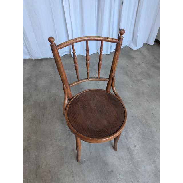 Very rare dining chair was made around the 1960s in Thonet style. It is made completely out of wood with round seat and...