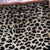 A beautiful piece of Clarence house leopard velvet. A very sturdy fabric great for Upholstery with ivory black, and a...