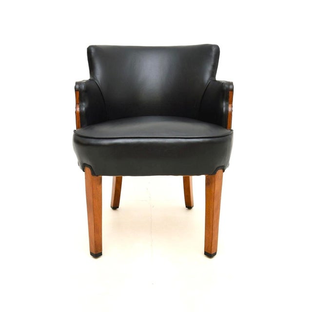 A smart and very comfortable Art Deco walnut and leather armchair / desk chair. This was made in England, it dates from...