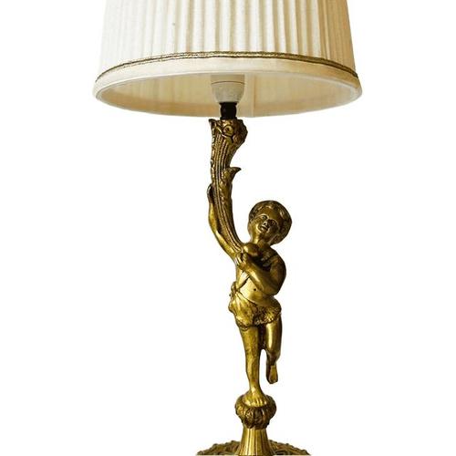 Bring classic elegance and a touch of mid-century glamour to your interior with this beautiful gold-coloured table lamp....
