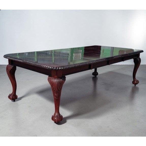 Edwardian Extending Dining Table. 2 Extra Leaves. Opens and closes easily. Chippendale style with large ball and claw feet...