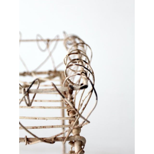 This Victorian era demilune plant stand wears its original, now wonderfully mottled whitewash metal. The stand features...