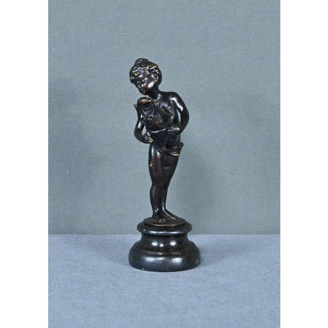 This charming little bronze entitled “Young Girl with a Basket” dates from the end of the 19th century. It represents a...