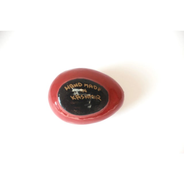 Width: 3 Inches; Height: 1.75 Inches Sweet little vintage Kashmir egg shaped trinket box made from papier maché, hand...