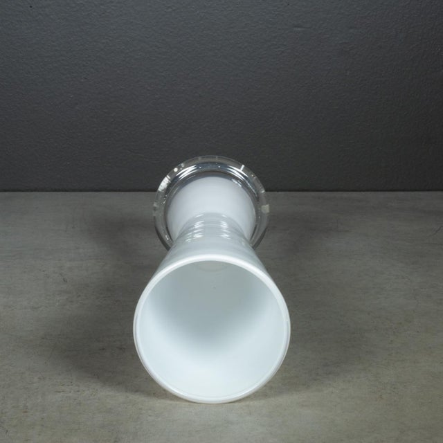 ABOUT An Orrefors white cased vase. Signed. CREATOR Signed Orrefors, Sweden. DATE OF MANUFACTURE c.1989-2000. MATERIALS...