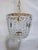 A beautiful vintage crystal chandelier that combines timeless European elegance with Hollywood Regency glamour. Featuring...