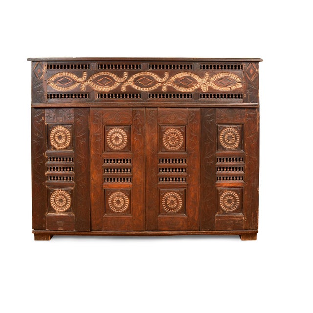 Beautiful and ornate carved French from Brittany cabinet. Two doors across the front. Antique. Height 58 inches, width 71...