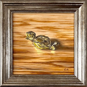 Golden Sweet by Robin Hextrum | Oil On Linen Panel Still life of a wrapped candy on a wooden surface.
