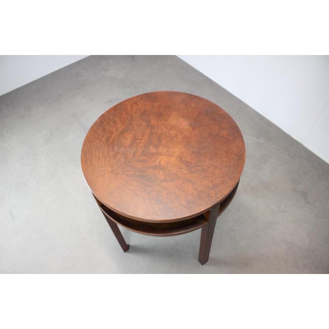 An authentic 1930s Czechoslovak Art Deco table crafted entirely in mahogany veneer. The piece showcases classic period...