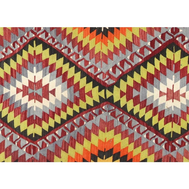 1950s Turkish Kilim Rug. Hand woven with wool on wool foundation in the Oushak region of Turkey. Kilims & Flat Weaves are...