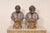 An Italian pair of hand-painted paper mâché male busts. These vintage art decorations from Italy have been artfully...