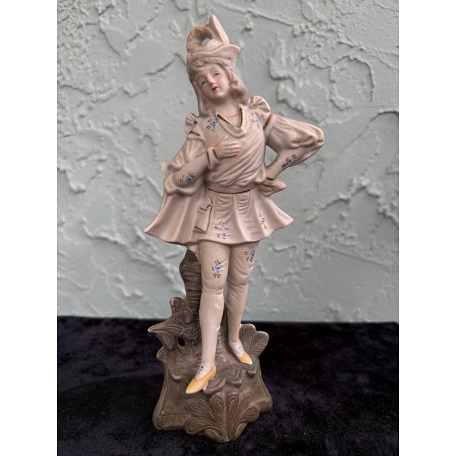 This charming vintage porcelain figure was produced by Fern Japan, a maker known for its finely modeled and delicately...