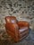 This vintage French leather club chair was produced in France during the 1940s–1950s and exemplifies the classic Art...