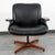 Molded plywood lounge chair by George Mulhauser. This chair features a unique low-profile design, black upholstery, and a...