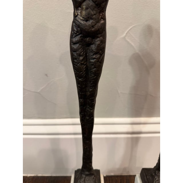 Late 20th Century Pair of Giacometti Style Male & Female Figural Sculptures on Marble Bases For Sale - Image 16 of 17