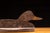 Vintage folding duck decoy, constructed of wood. 16"W x 7"D x 6"H. This duck decoy features a compact, foldable design...