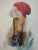 Charming bunny art print featuring a red hat and vintage camera. Soft watercolor tones and green accents create a cozy,...