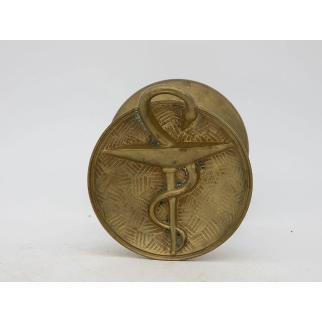 A vintage French pharmacy door handle made of brass. Great to repurpose as pulls on a cabinet or equally interesting on a...