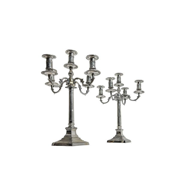 A stylish pair of 5-arm candlesticks made of silver-plated brass, very substantial and of excellent quality. Fluted design...