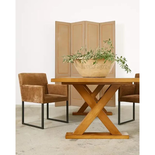 Handsome set of six dining chairs consisting of two armchairs measuring 22.5 inches wide and four side chairs. Attributed...