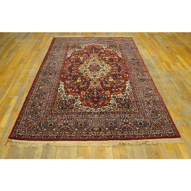1930s Persian Isfahan Carpet 4' 11"x 7' 5" Isfahan The modern Isfahan of very fine weave, often on a silk foundation and...