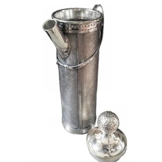This fabulous silver-plated cocktail shaker is an exact copy of a golf bag down to the stitching, leather material,...