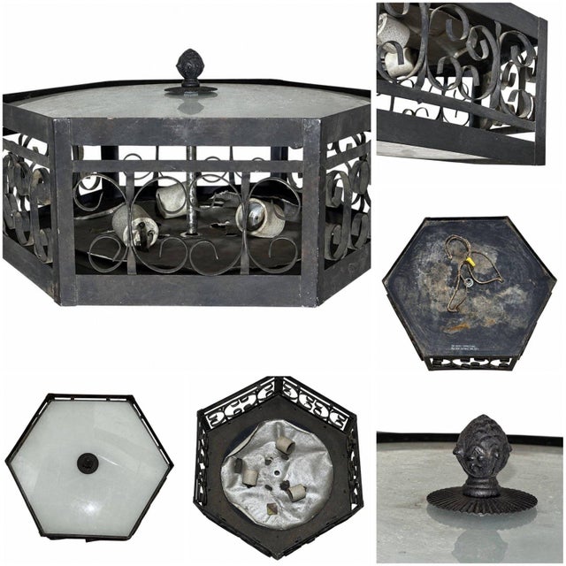 Bring authentic vintage character to your interior with this Spanish Revival Style Wrought Iron Pendant Light Fixture....