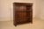 Late 19th century oak hand carved bookcase from France. The top of the bookcase features a lovely and well proportioned...
