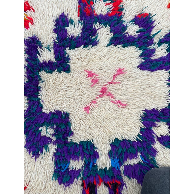 Introducing the exquisite Berber Vintage Azilal Rug, a true masterpiece of craftsmanship and design. This rug is handwoven...