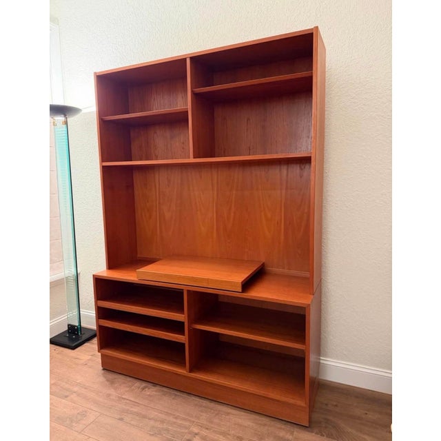 Danish Mid-Century Modern(MCM) design from the 1960s. Made in Denmark by Poul Hundevad. Teak wood with pronounced vertical...