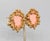 Modernist "gold nugget" texture around the edges with goldtone coral resin center clip back earrings. Marked "NAPIER PAT....