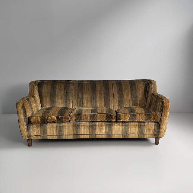 Italian art deco striped velvet sofa, 1930s Sofa with rounded backrest and armrests in shades of yellow and brown....