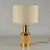 Bitossi cylinder shape table lamps where produced in stoneware with a natural glaze. The border at the neck is gilded, the...