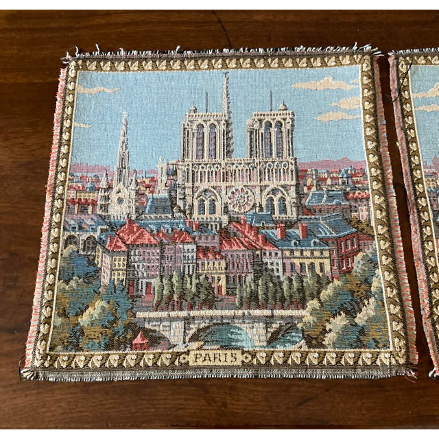 This lovely set of 2 vintage French tapestries captures iconic Parisian landmarks—the Eiffel Tower and Notre Dame...