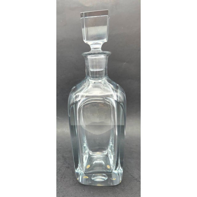 Offered is a vintage mid 20th Century crystal decanter with a matching faceted stopper, desogned by Gerda Strömberg and...
