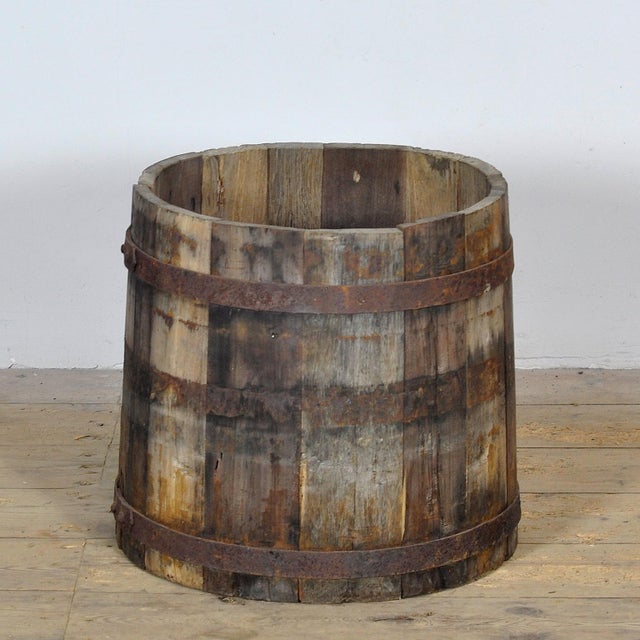 Authentic oak storage barrel with a robust and rustic appearance. This sturdy barrel is made of solid oak wood and...