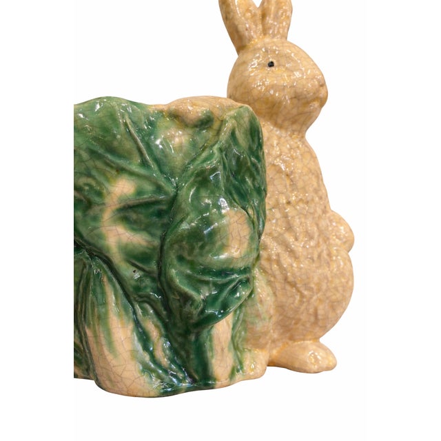 Charming vintage ceramic bunny figurine planter featuring a beautifully modeled cabbage leaf motif in rich green and...