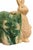 Charming vintage ceramic bunny figurine planter featuring a beautifully modeled cabbage leaf motif in rich green and...
