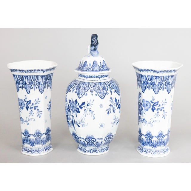 A gorgeous petite set of three antique Delft transferware garniture vases made between 1900 and 1930, attributed to Mosa...