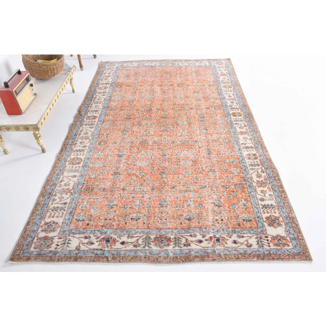 Vintage Turkish Hand-Knotted vintage rug is a semi-antique vintage area rug.'70s Eastern region of Turkey's unique rug is...
